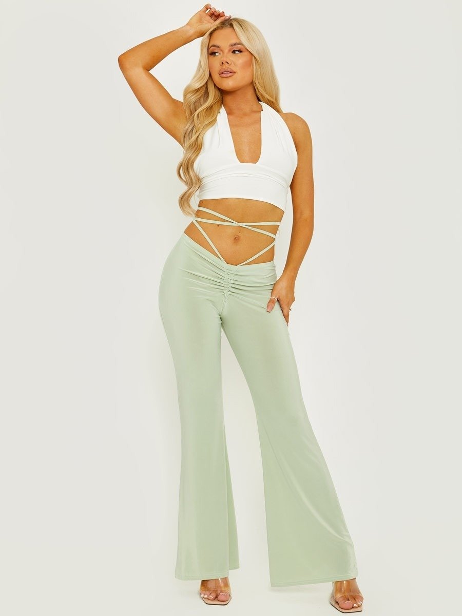 High-waist, flared trousers - Lime Green